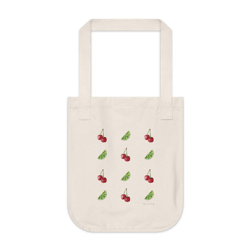 Beige tote bag with cherry designs on a white background