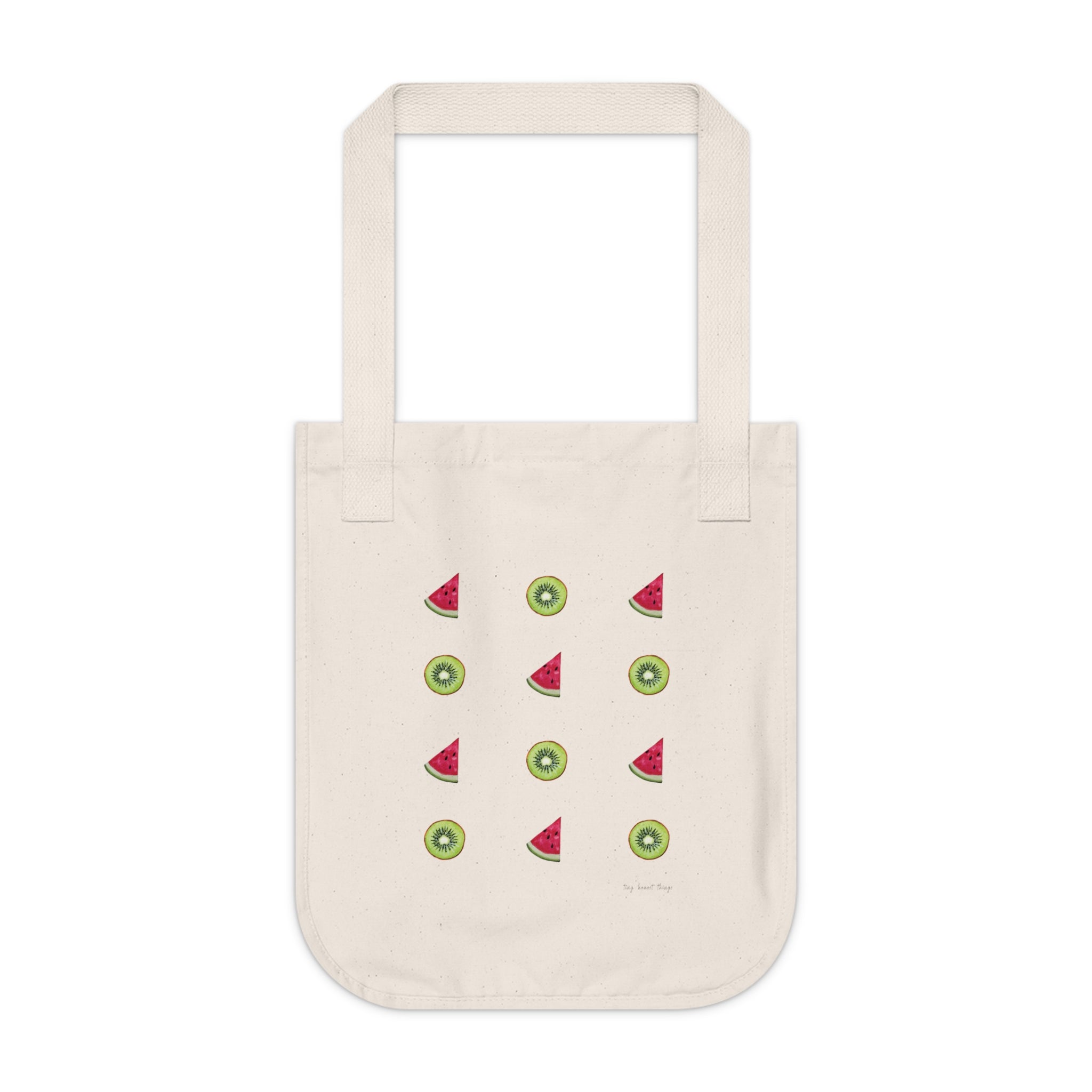 Beige tote bag with watermelon and kiwi pattern on a white background
